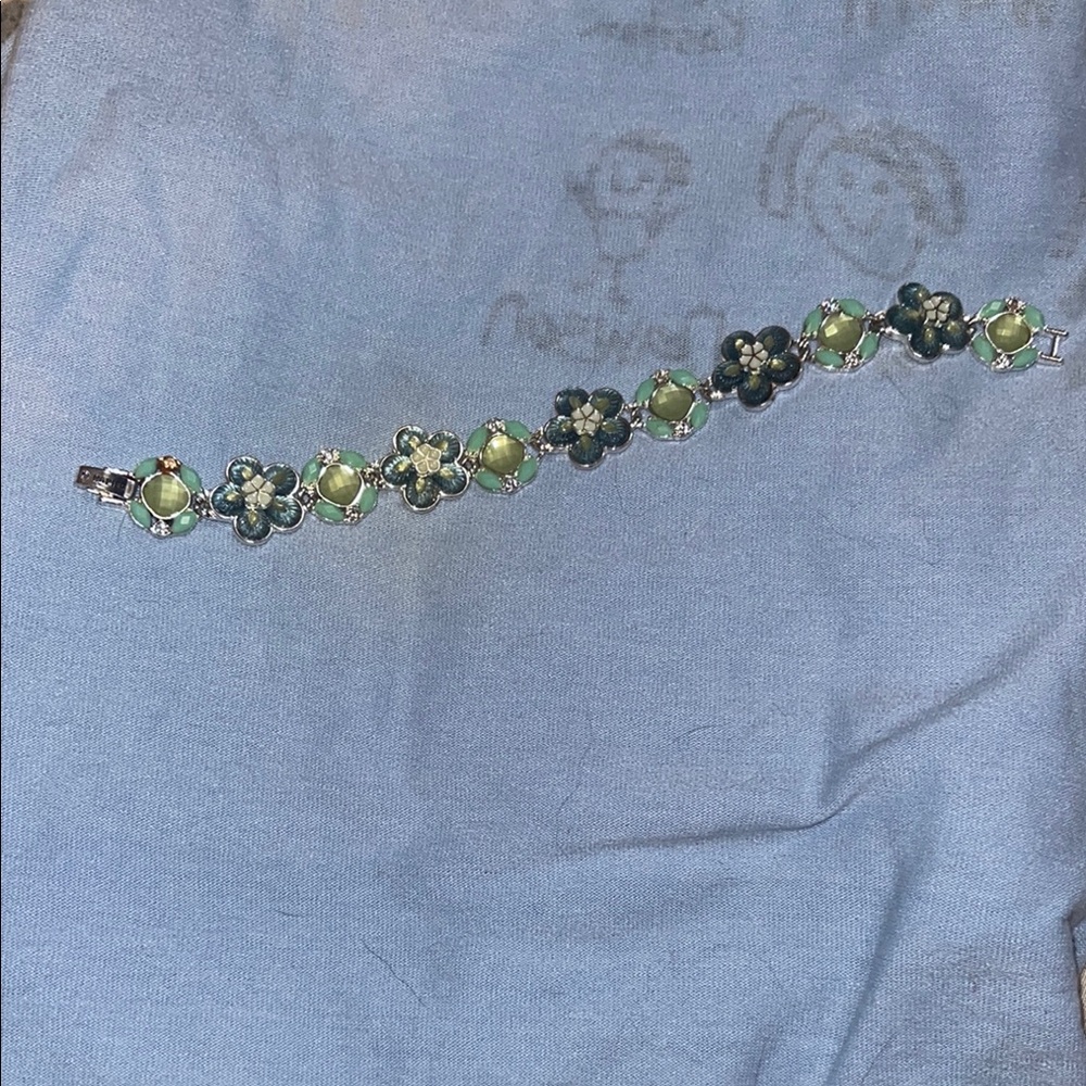 Charming Floral Bracelet with Green Accents